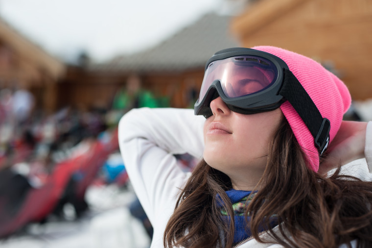 Woman in Ski Goggles Dreaming